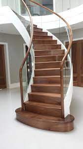 Fabricated Mild Steel Helical Staircase With Timber Treads Risers And Handrail And Structural Glass B Staircase Design Staircase Decor Glass Staircase Railing