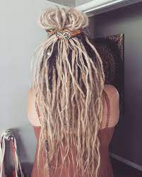 Set the locks with dread wax and hold them in place with rubber bands at the top and bottom of the dread. Gypsyandhercowboy Blondedreads Girlswithdreads Top Bun Hippie Hair Rasta Hair Dreadlocks Girl