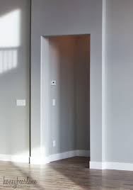 The baseboard will be flush with the 5/8 inch drywall, so prep happens first: Diy Doorway Trim Honeybear Lane