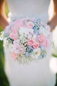 Snowflake baby's breath with double white flowers, hundreds in a spray. Pastel Pink And Blue Flowers With Baby S Breath A Wedding Bouquet With Style Via Stay At Home Mu Wedding Bouquets Pink Blue Wedding Bouquet Soft Pink Wedding