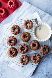 These delicious mini bundt cakes have swirls of rich chocolate mixed into most vanilla batter, all topped with collection of the best mini bundt cake recipes ever. Mini Gingerbread Bundt Cakes With Maple Glaze The Beach House Kitchen