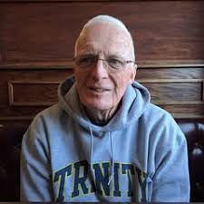 My grandfather is in the lettered sweater. It's a letter “B”. He went to  Joe Bradley High School in Huntsville. Some of his family is with him in  this picture. This pic