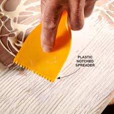 It works just like a regular contact adhesive paste, but it's much easier to get a thin coat on the vinyl, which is necessary to ensure there are no ridges or raised points under your new floor. 5 Great Wood Gluing Tips Make
