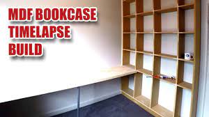 Stick the board's end over the edge of your bench so that the fence, not the tool's base, sets the slot depth. Making Mdf Cube Storage Bookcase Desk Gosforth Handyman