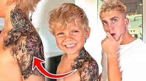 There is a banner around the arrow which has the name 'apollo' written on it. Jake Paul Tydus Got His First Tattoo Wtf Facebook