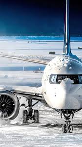 ❄️ Frozen but Ready – Jet Power in Arctic Conditions! 🛫🌨️ Boeing 737 MAX  facing the harsh winter head-on, covered in ice and snow while taxiing  across a frozen runway.