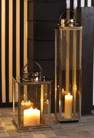 Son photophore en verre vous permettra d'y glisser une bougie et son anse de la transporter facilement et la poser où vous voulez. Lanternes Fancy Home Collection 13 Interior Waterloo Belgium Bougies Candles Lanterne Belgium Lanterns Decor Candle Lanterns Lantern Lamp
