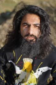 Man with Thick Black Beard Wearing Graphic T-Shirt · Free Stock Photo