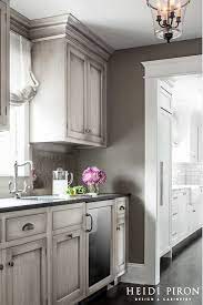 ◦ legs are distressed or stained to match the riser. Like The Stained Weathered Gray Cabinet Finish Kitchen Cabinets Painted Grey Grey Kitchen Designs Glazed Kitchen Cabinets