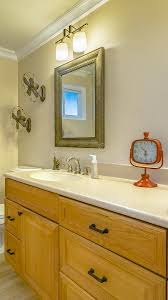 We're always at the sink together before bed and it's nice to wash my face, brush, floss, wash hands to remove contacts etc without being in his way. Double Vanity Sink In A Bathroom With Stone Tiles Counter Stock Photo Image Of Towels Design 224046720