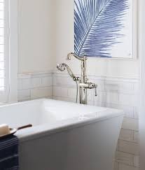 Put your favorite bath salts on display by transferring them into clear decorative bottles. 33 Modern Coastal Bathrooms With Classic Style