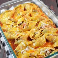 Mexican Stuffed Shells With Ground Beef Yellow Onion Taco Seasoning Cream Cheese Jumbo Pasta Shells Enchilada Sauce Sal Mexican Food Recipes Food Recipes