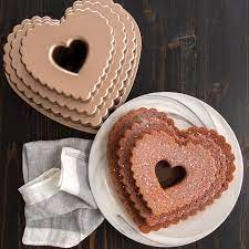 Made of cast aluminum, this pan provides fine details and superior baking performance with its premium nonstick interior, which makes release and cleanup a breeze. Nordic Ware Tiered Heart Bundt Pan Nordic Ware Bundt Pan Nordic Ware Bundt Pan