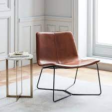 Add this limones genuine leather upholstered arm chair to create some originality in your design. Slope Leather Lounge Chair