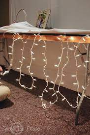 Andrea Howard Blog Decorating A Cake Table With Lights And Tulle A Tutorial Wedding Cake Table Decor 50th Wedding Anniversary
