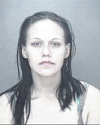 Four charged in double-murder