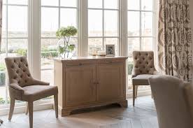 Generously proportioned, its sit waves out for a spacious sit and slight wraparound shape. Neptune Henley Upholstered Dining Chair 1933 Furniture Company