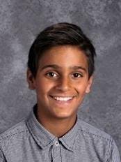 Ali K. Hashim, 13, died Tuesday night after being hit by a truck