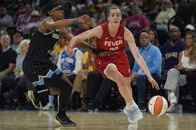 Caitlin Clark has career-high 31 points, 12 assists as Fever beat Sky  100-81 despite Reese record | AP News