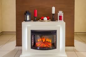 Considering a combination of these settings, it costs between $50 and $80 a year to use an electric fireplace, considerably less than the annual cost for a gas fireplace, with costs ranging between $200 and $500 annually. Electric Fireplace Installation Cost New Electric Fireplace Prices