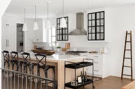 Steel kitchen island cart quartz topped bar. Black Bar Cart At End Of Oak Island Transitional Kitchen