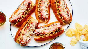 Steins brimming with cold lager, sizzling sausages served with mounts of sauerkraut, a boisterous song playing overhead: The Definitive Guide To Oktoberfest Sausages Epicurious