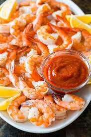Fresh lemon wedges, with their bold yellow color, can look attractive on any type of shrimp platter, including classic ones. Shrimp Cocktail Recipe Video Natashaskitchen Com