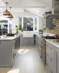 A pair of restoration hardware harmon pendants illuminate a gray. 46 Best Copper And Grey Kitchen Ideas Kitchen Inspirations Grey Kitchen Kitchen Design