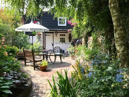 How To Decrease Road Noise In Your Backyard Cottage Garden English Cottage Garden Small Cottage Garden Ideas
