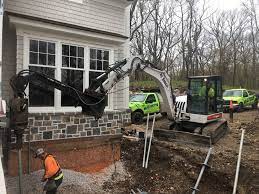 It was a complex job requiring coordination with the company putting in the new foundation. Residential Mudjacking Concrete Leveling Services In Wi Free Estimate On Driveway Sidewalk Concrete Repair Wisconsin Mudjacking Specialists Slab Jacking Milwaukee Madison Mudtech Midwest Concrete Repair Mud Jacking