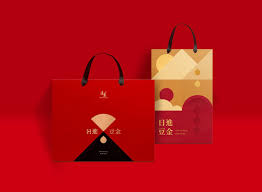 日進豆金新年禮盒紙袋on behance packaging design packing design red packet