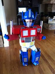 Watch as ben makes this charmingly diy optimus prime costume using a bunch of old boxes,. Optimus Prime Costumes For Men Women Kids Partiescostume Com