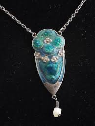 An Early 20th Century Art Nouveau Silver And Enamel Pendant Necklace By Liberty Co With Floral De Art Nouveau Jewelry Art Nouveau Silver Art Nouveau Pendant