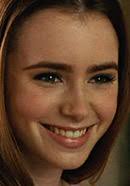 Lily collins is an english actress, model, producer, and writer who is the daughter of musician phil collins and his 2nd wife jill tavelman. The Blind Side True Story Real Leigh Anne Tuohy Michael Oher