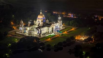 Victoria Memorial illuminated after dusk, AI generated