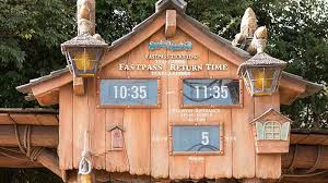If you can read japanese, this is a good app for iphone, and this one is a decent choice for android. Official Disney Fastpass Tokyo Disneyland