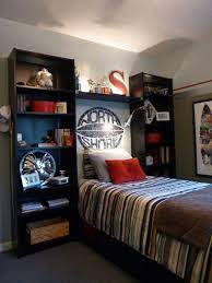 Designing a teen boy bedroom is rather a difficult task because it's not easy to please a teenager, to make the room functional. 50 Teenage Boys Room Designs We Love Boys Room Design Small Boys Bedrooms Teenage Boy Room