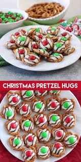Kids can be picky eaters on their best days, but you're in luck! These Festive Christmas Pretzel Hugs Are Melted Just Enough To Press An M M On The Top Let Cookies Recipes Christmas Christmas Snacks Christmas Candy Recipes