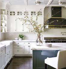 Harking back to an earlier time, this traditional colonial kitchen pairs simple white furnishings with blue accents and updated fixtures. Friday Inspiration Cool Wallpaper Studio Mcgee White Kitchen Traditional Home Kitchens Kitchen Design