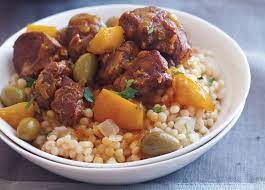 Dissolve the stock cube in 250ml boiling water, then pour over the couscous. Lamb Tagine With Olives Preserved Lemon And Couscous Williams Sonoma Taste Tagine Cooking Tagine Couscous Recipes