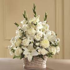 Some flowers & colors may vary. White Funeral Flowers In A Basket Ital Florist