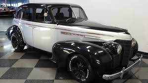 Image result for Trojan Maroon 1939 Oldsmobile