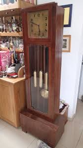 The mechanism in comprised of gears and parts inside of a clock movements case. 1920 S German Hawina Art Deco Westminister Chime Grandfather Clock Top 1400 Product Posted By Old Europe Clocks On The Find It Guide Military And Business Directory Cars Properties Classifieds And More