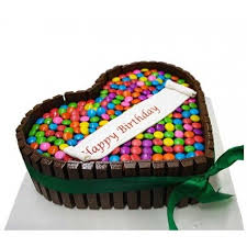 Birthday Cake Heart Shape Chocolate Cake Decoration A Heart Shape Kitkat Chocolate Cake With Colorful Gems And Tie In A Pretty Green Ribbon Amazing Present For Chocolate Kit Kat Cake Heart Shaped Cakes Gem Cake