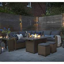 Build a round, brick fire pit in a corner of your backyard: Kettler Palma Fire Pit Corner Set Off 52