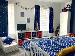 Make your kids' room more live by having some ornaments like small round planets, mural, painting, and also space lamp. Our Boys Space Themed Bedroom Makeover Hello Mrsshilts