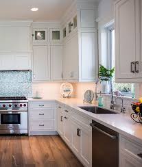 Kitchen Backsplash The White Beveled Subway Tiles Are Porcelanosa Retro Bainco 4 X 8 White A White Shaker Kitchen Kitchen Style White Shaker Kitchen Cabinets