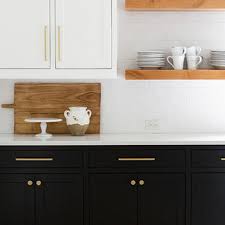 modern kitchen with black cabinets