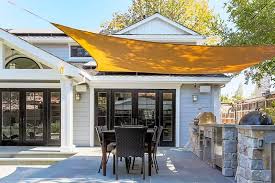 These outdoor shades and sails have really good reviews! 15 Smart Patio Deck Shade Ideas Trees Com