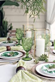 After the meal has begun, most guests will chose either a white or red wine and the unused glass can be removed. Table Decoration Green Dinner Table